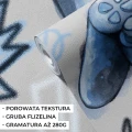 Gaming room z niebieską tapetą i dodatkami dla gracza