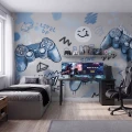 Tapeta Gaming Niebieska do pokoju chłopca z motywem padów i napisem Game Zone