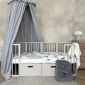 Stylowe drewniane łóżeczko 7w1 Waldin w kolorze Cashmere do nowoczesnego pokoju dziecka