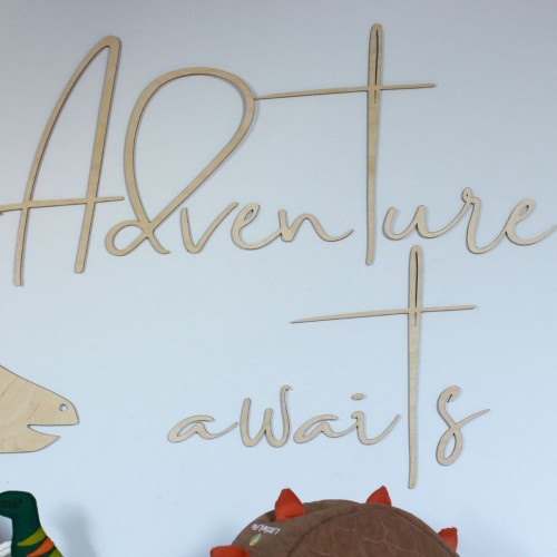 Wooden inscription on the wall for a child's room